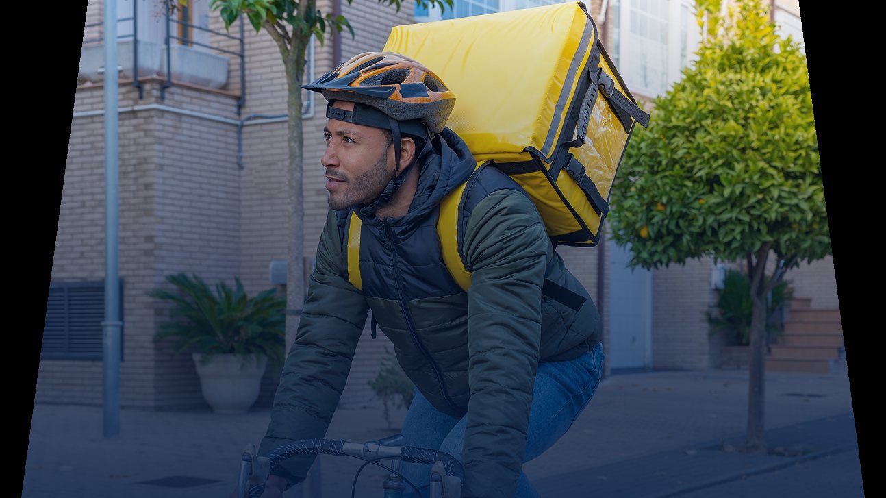 Delivery courier checking his next drop