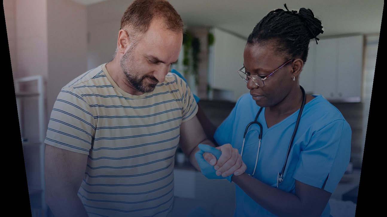 Healthcare worker assisting a patient